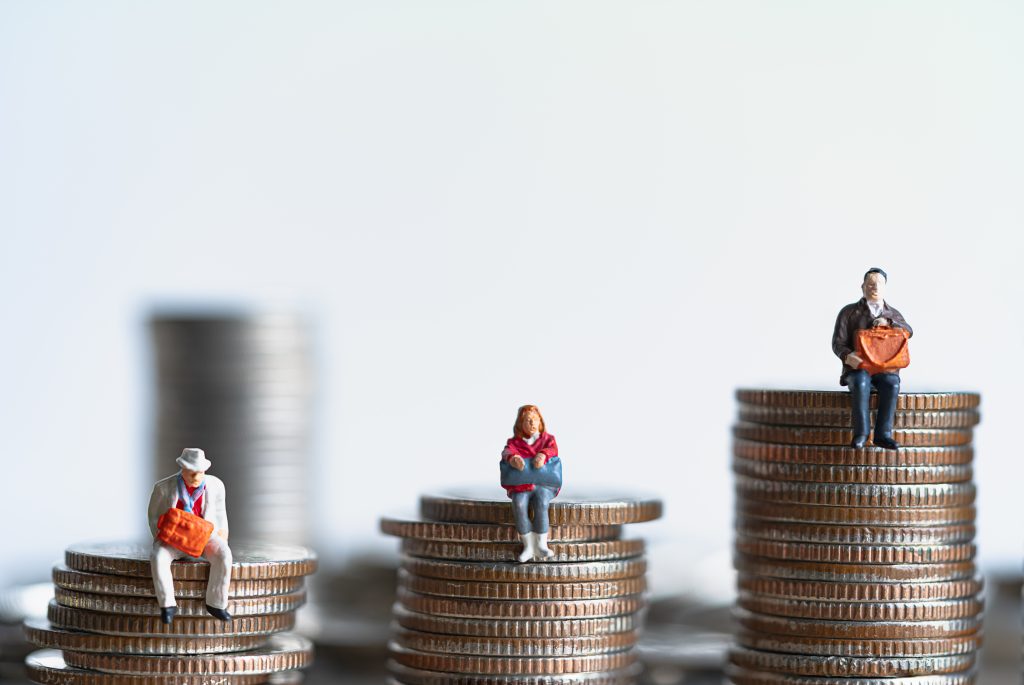 old pensioners sitting on coins